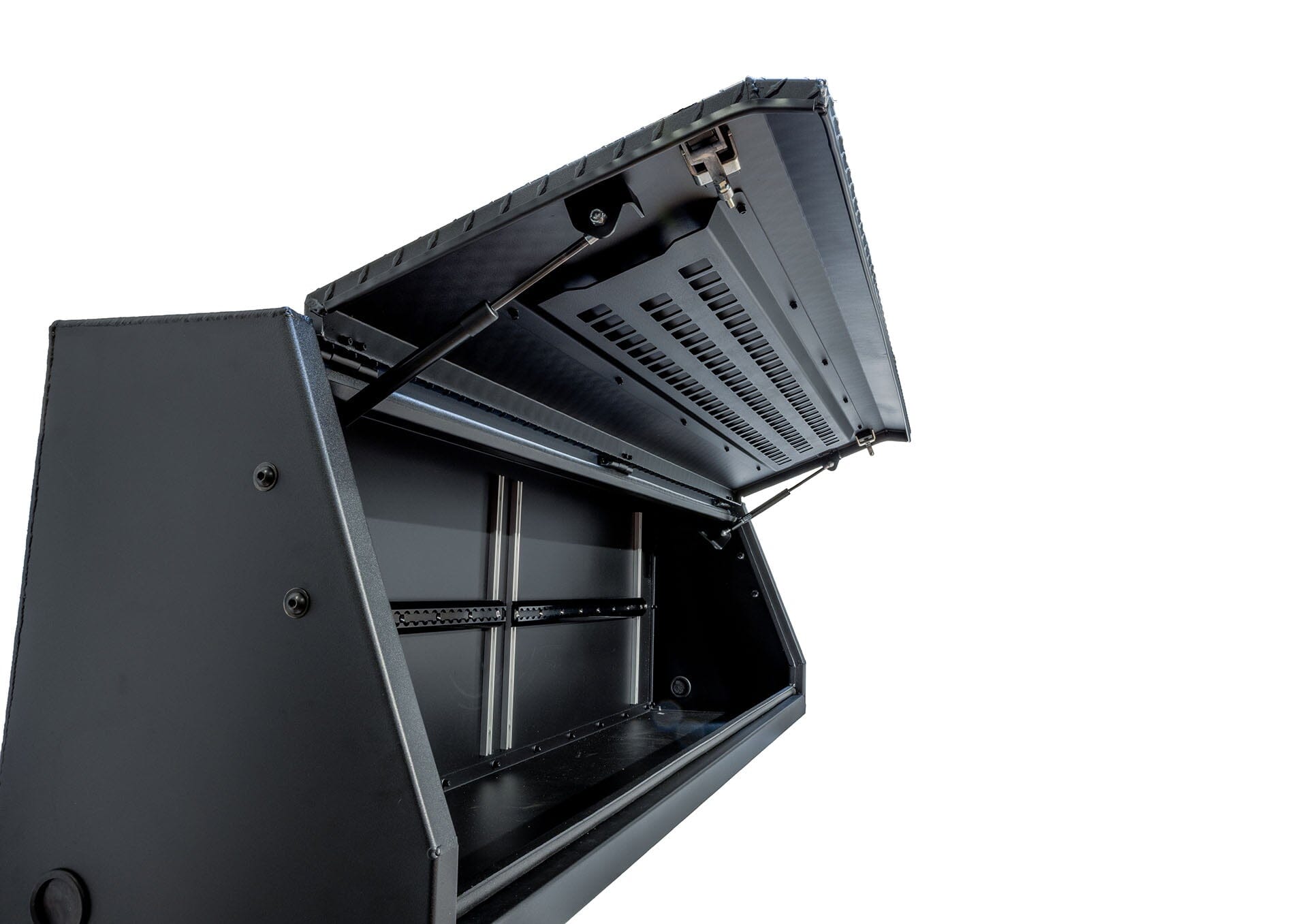 A photo featuring an open ADAPT Top Side Truck Bed Toolbox, made by Chandler Truck Accessories. Inside the truck storage system you can see that is very modular and organized for tool storage.