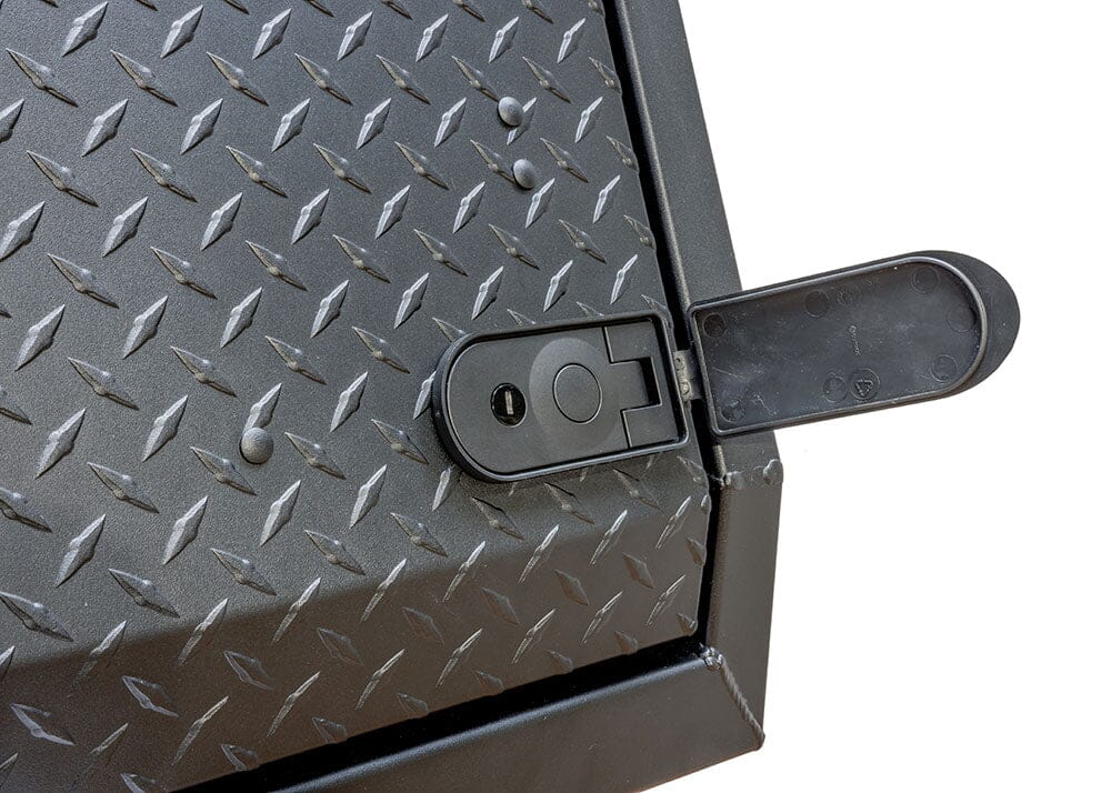 Up close photo of an ADAPT Top Side truck toolbox latch that is open, photo features a white background.