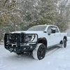 Customer's white GMC Sierra with Chandler Truck Accessories Full Brushguard Front Bumper installed