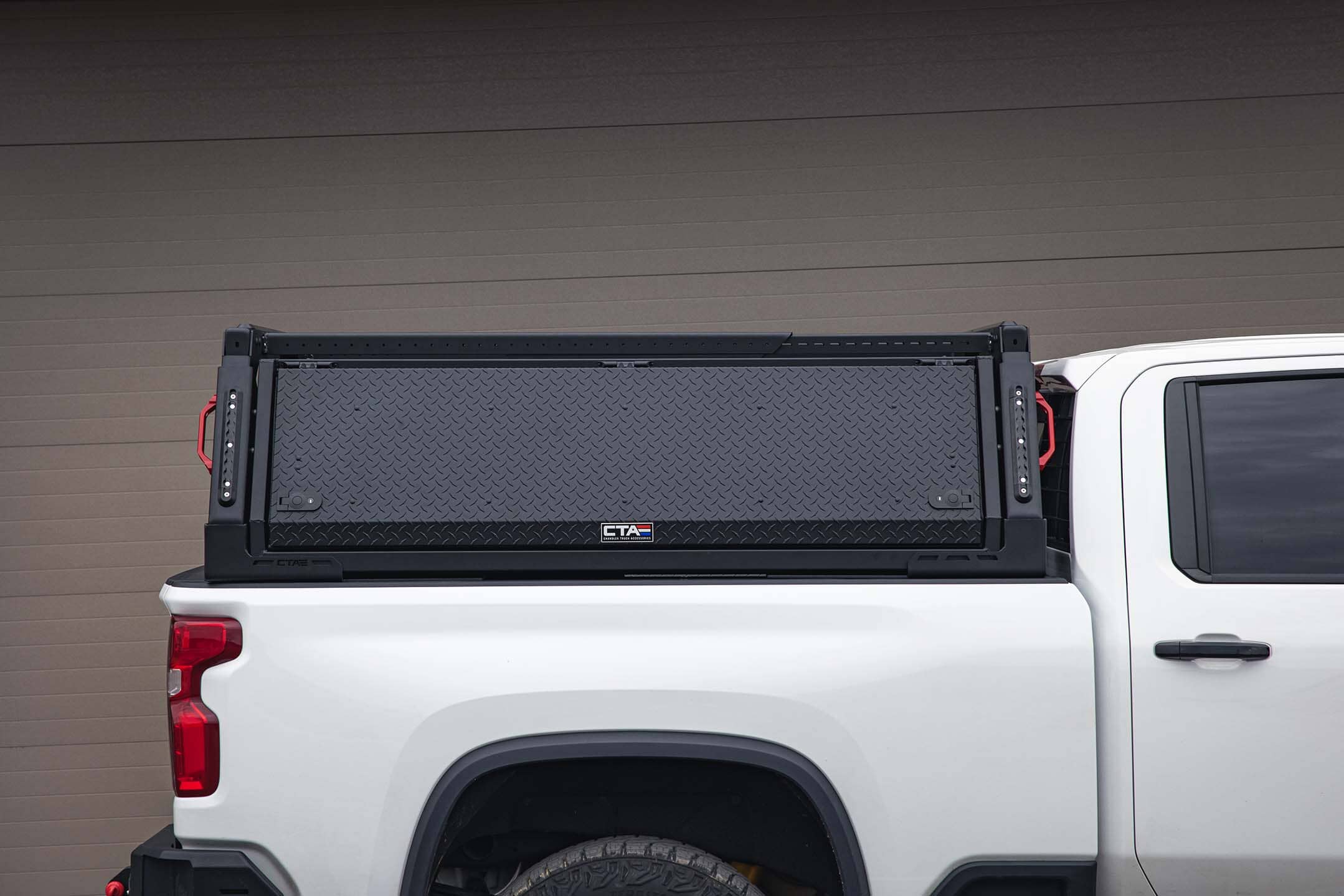 A picture of a heavy duty side truck tool box truck. It appears the large weather proof truck tool box is very durable and can hold many tools.