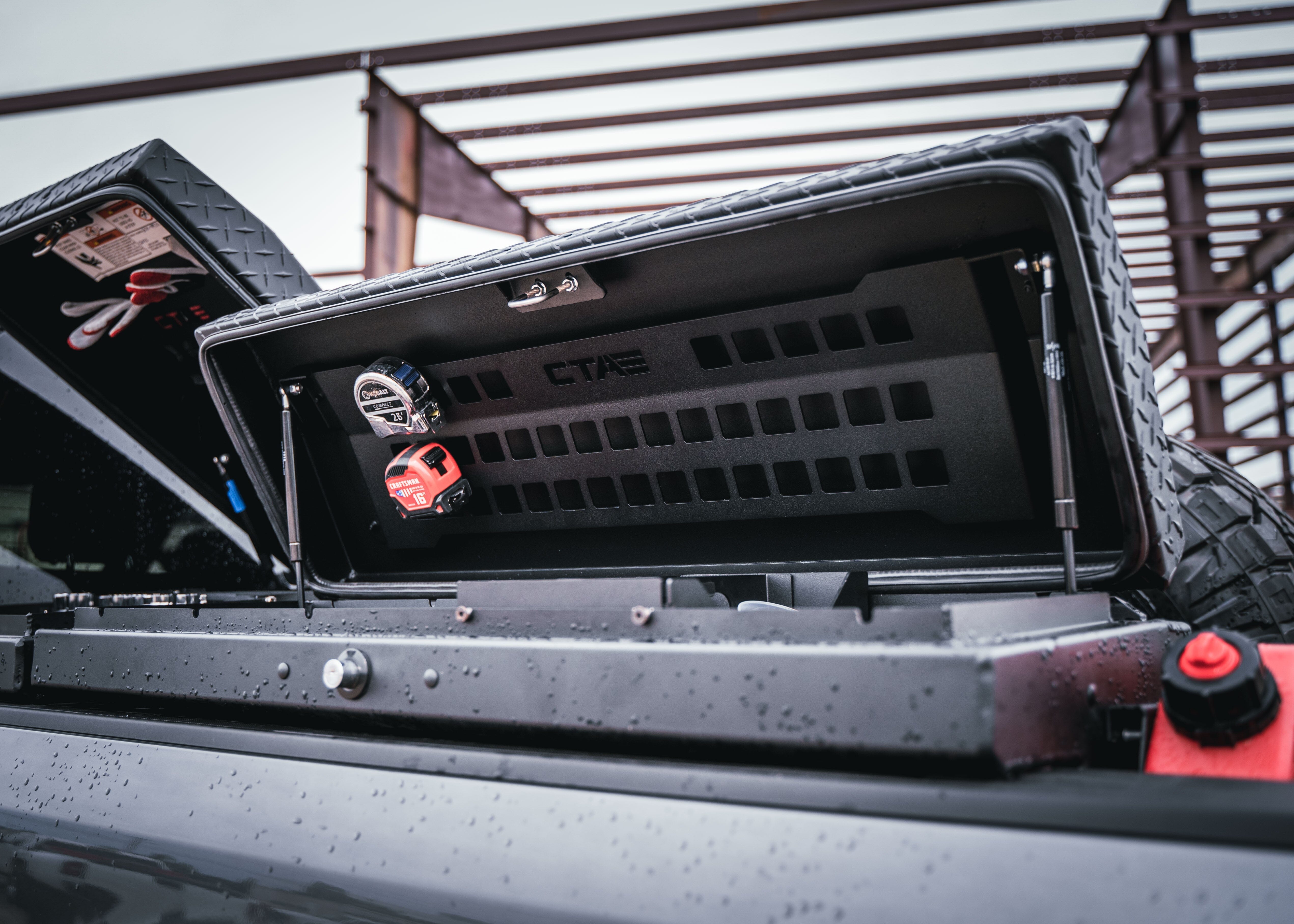  Opened Lo-Side Truck Toolbox attached to side of truck